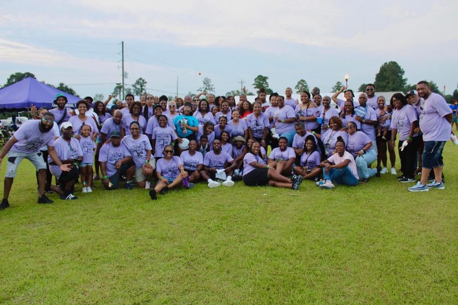 Cousins Day attendees in matching family shirts